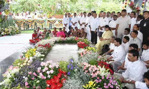 YSRCP president Y S Jagan Mohan Reddy along with his family members pays tributes to his father and former chief minister Y S Rajasekhar Reddy on his death anniversary at Idupulapaya on Wednesday