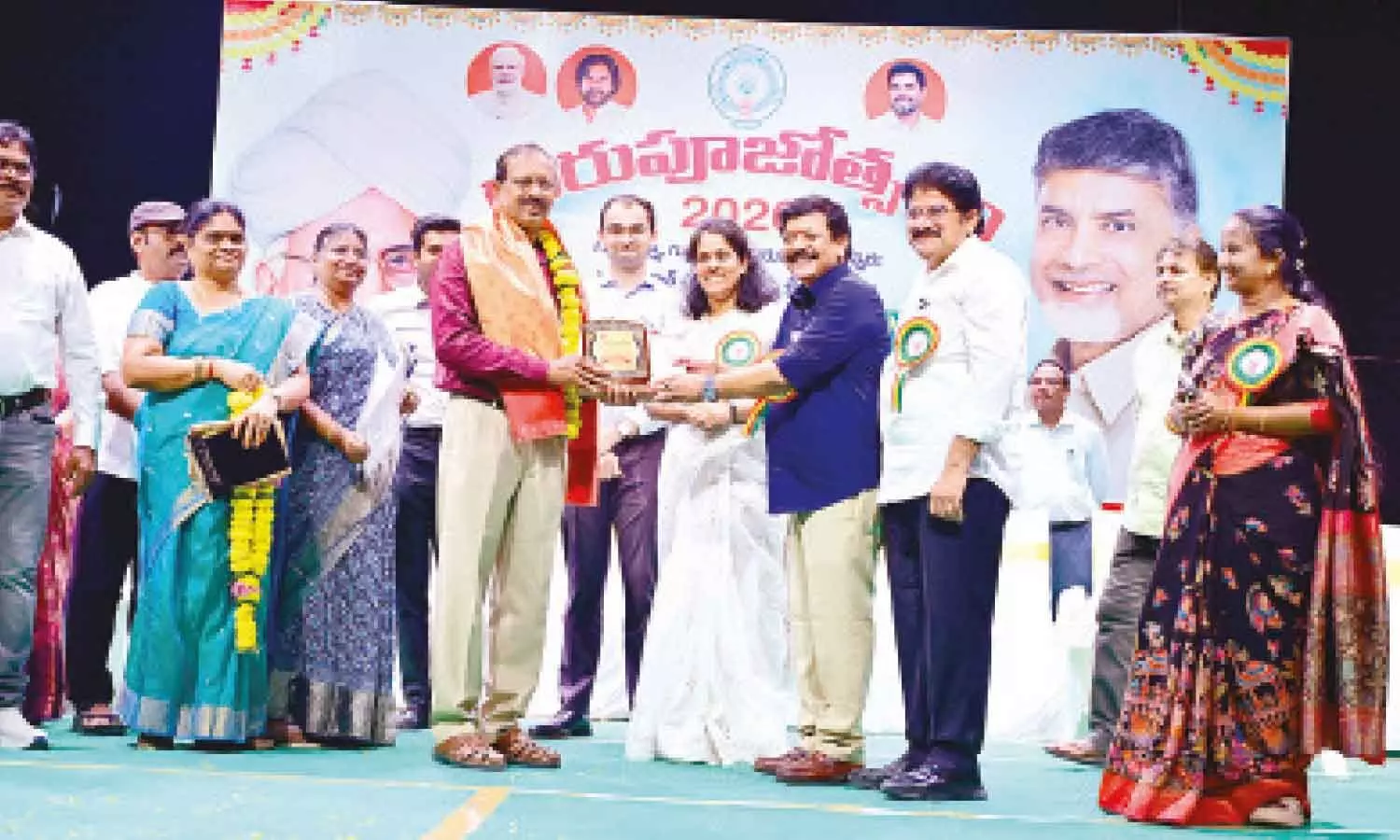 Minister Kandula Durgesh presenting Best Teacher awards at a programme in Rajamahendravaram on Saturday Minister Kandula Durgesh presenting Best Teacher awards at a programme in Rajamahendravaram on Saturday