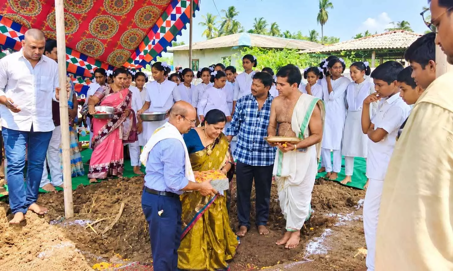 NLVRGSRV School Principal Mandali Brahmaneswaramma laying foundation stone for the construction of a boys’ dormitory at the school in Nimmakuru on Saturday NLVRGSRV School Principal Mandali Brahmaneswaramma laying foundation stone for the construction of a boys’ dormitory at the school in Nimmakuru on Saturday