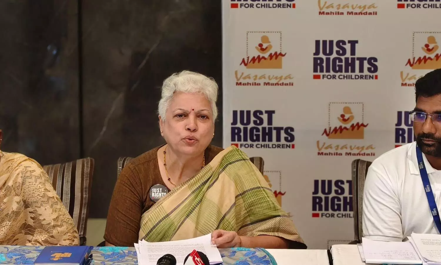 Vasavya Mahila Mandali president Dr Bollineni Keerthi addressing the media in Vijayawada on Sunday Vasavya Mahila Mandali president Dr Bollineni Keerthi addressing the media in Vijayawada on Sunday