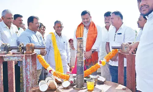 Minister M Ramprasad Reddy releasing water into the Veligallu project on Sunday