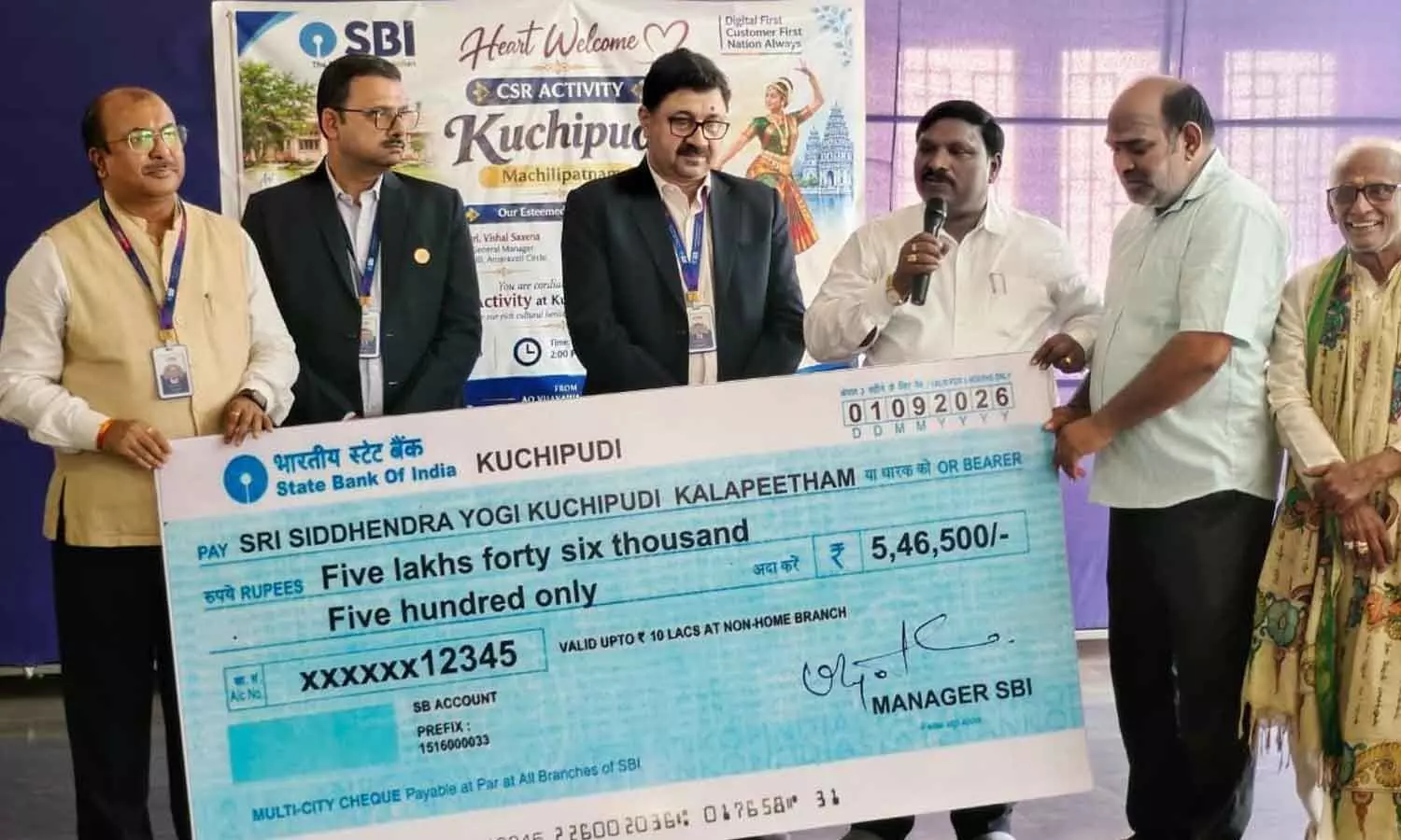 SBI officials presenting the cheque to Registrar of Potti Sreeramulu Telugu University M Srinivasa Rao in Vijayawada on Monday SBI officials presenting the cheque to Registrar of Potti Sreeramulu Telugu University M Srinivasa Rao in Vijayawada on Monday