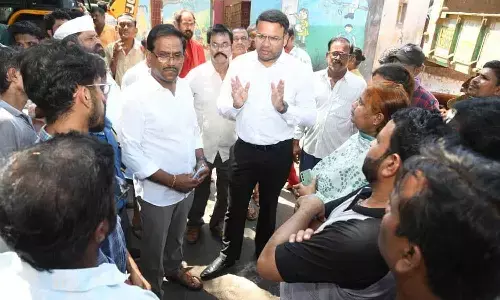 GVMC Commissioner Ketan Garg interacting with locals at Lakshmi Nagar, Velampeta in Visakhapatnam on Monday