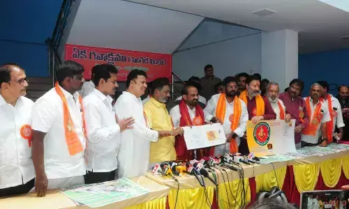 Health Minister Satya Kumar Yadav releasing the “Parvati Putra – Paryavarana Mitra” poster alongside Varasidhi Vinayaka Mahotsava Committee members in Tirupati on Monday
