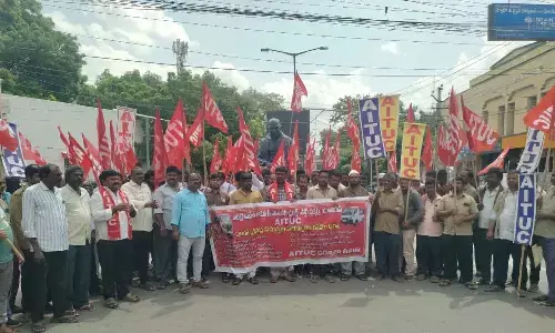 Auto workers union staging a protest in front of the Collectorate on Monday
