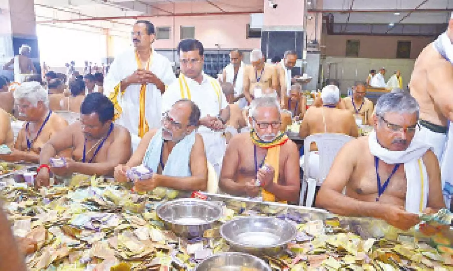 Sri Durga Malleswara Swamy Varla Devasthanam EO VK Seena Naik supervising the counting of hundi collections at the Mallikarjuna Maha Mandapam atop Indrakeeladri in Vijayawada on Wednesday Sri Durga Malleswara Swamy Varla Devasthanam EO VK Seena Naik supervising the counting of hundi collections at the Mallikarjuna Maha Mandapam atop Indrakeeladri in Vijayawada on Wednesday