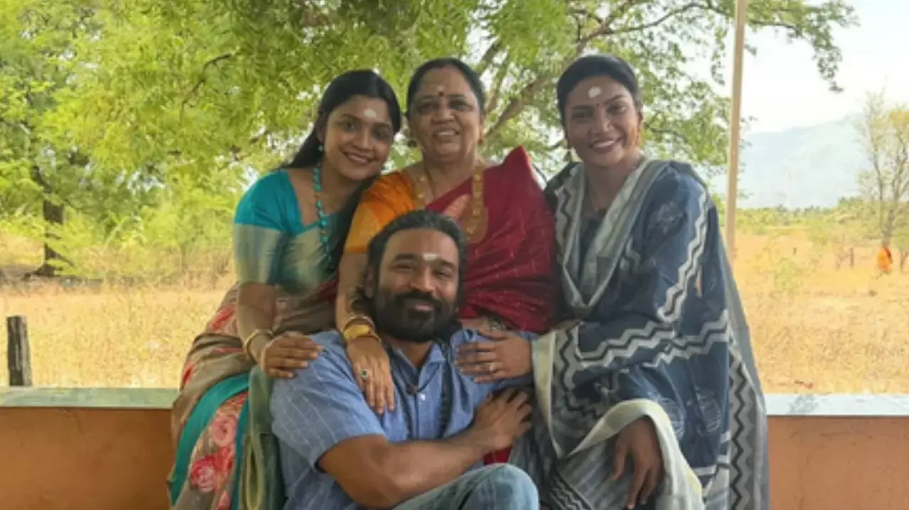South sensation Dhanush posed with his mother and sisters for a perfect family pic South sensation Dhanush posed with his mother and sisters for a perfect family pic