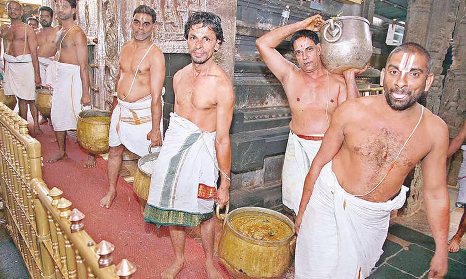Srivari Potu staff carrying naivedyam items Srivari Potu staff carrying naivedyam items