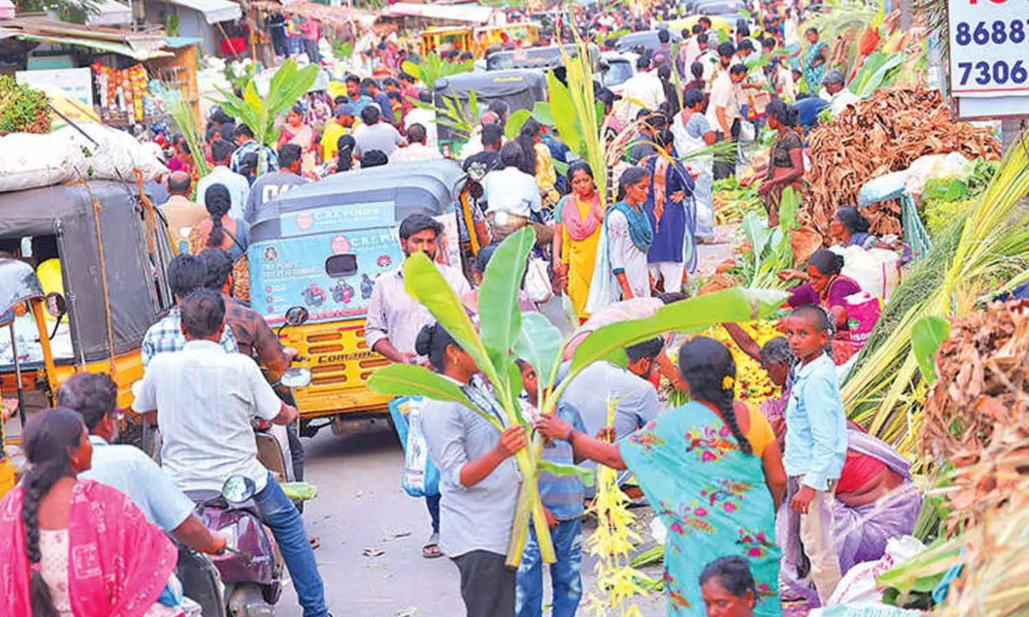 Denizens purchasing pooja material in Tirupati on Sunday Denizens purchasing pooja material in Tirupati on Sunday