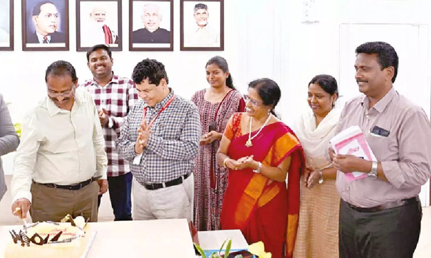 Dr Pulala Chandrashekhar, Vice-Chancellor of Dr NTR University of Health Sciences, Registrar Sai Sudheer and others celebrating Engineers’ Day Dr Pulala Chandrashekhar, Vice-Chancellor of Dr NTR University of Health Sciences, Registrar Sai Sudheer and others celebrating Engineers’ Day
