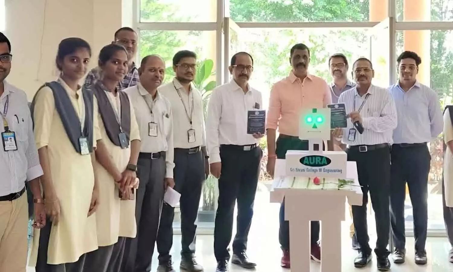 College faculty members and students with the ‘AURA’ robot at the campus in Srikakulam College faculty members and students with the ‘AURA’ robot at the campus in Srikakulam
