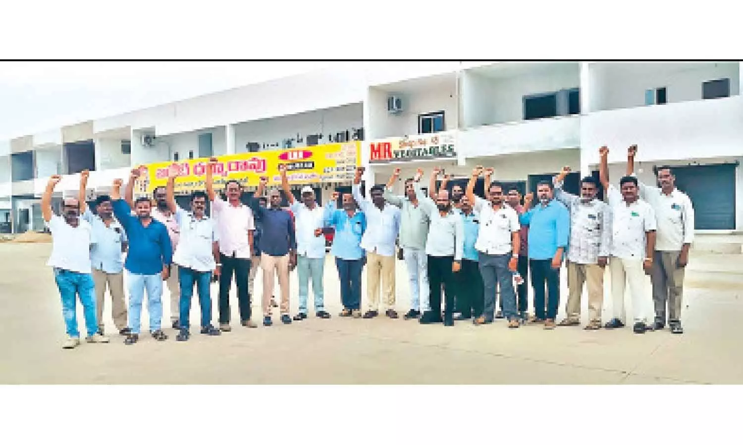 Representatives of the Sri Durga Malleswara Wholesale Merchants Association staging a protest at the market in Nunna near Vijayawada on Thursday Representatives of the Sri Durga Malleswara Wholesale Merchants Association staging a protest at the market in Nunna near Vijayawada on Thursday