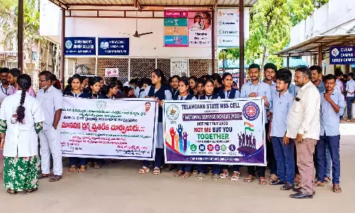 Vikas Group of Institutions students participating in the Youth Time Bank community service programme at the Government General Hospital in Vijayawada on Thursday