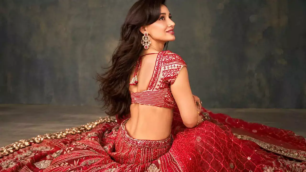 Disha Patani’s red lehenga sparks fashion debate at Ganpati celebration Disha Patani’s red lehenga sparks fashion debate at Ganpati celebration