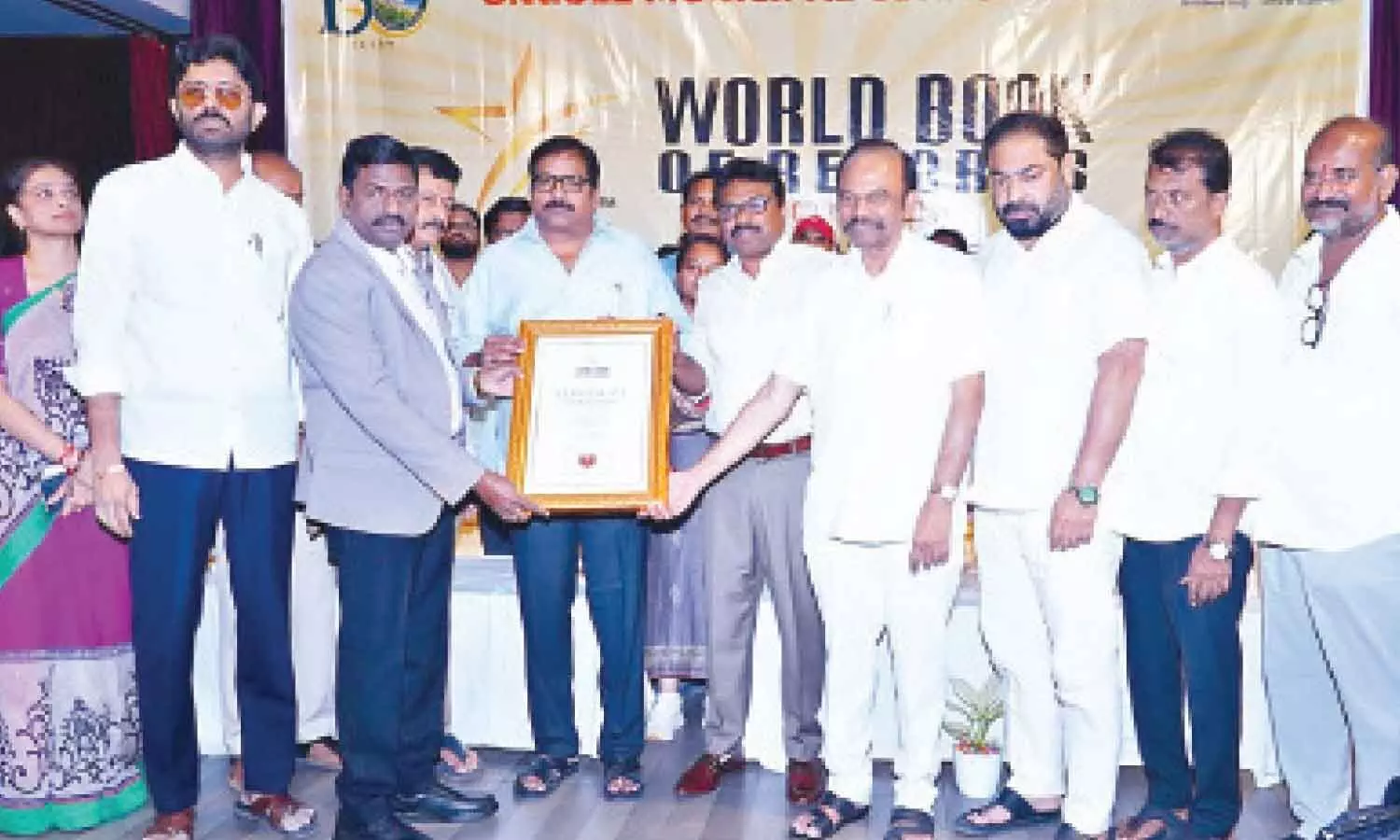 Municipal Commissioner T Venkata Krishnaiah, MLA Damacharla Janardhana Rao, Collector P Raja Babu, MP Magunta Srinivasulu Reddy and others receiving World Book of Records certificate in Ongole on Saturday Municipal Commissioner T Venkata Krishnaiah, MLA Damacharla Janardhana Rao, Collector P Raja Babu, MP Magunta Srinivasulu Reddy and others receiving World Book of Records certificate in Ongole on Saturday