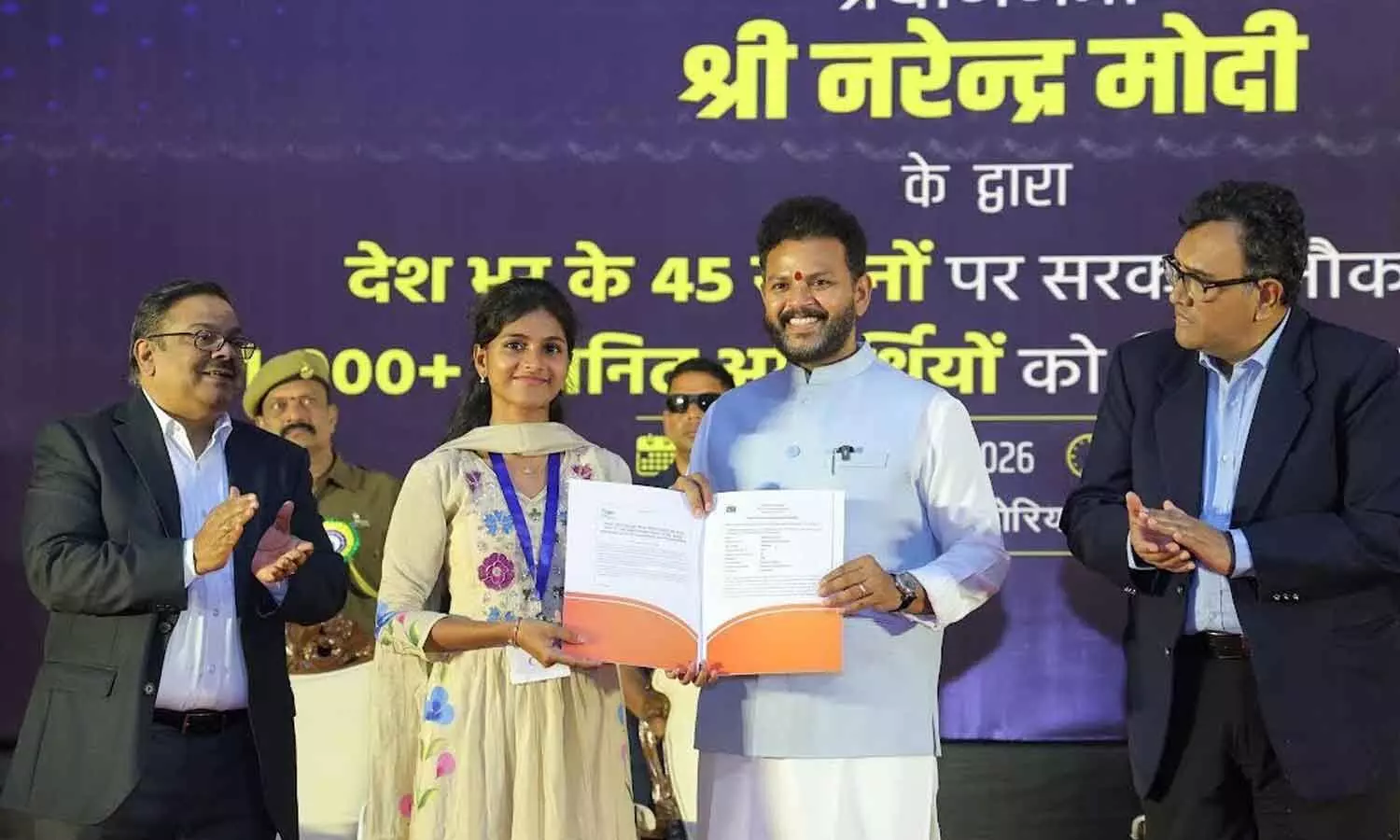Union Civil Aviation Minister K Ram Mohan Naidu handing over an appointment letter to a new recruit at Rozgar Mela held in Visakhapatnam on Saturday Union Civil Aviation Minister K Ram Mohan Naidu handing over an appointment letter to a new recruit at Rozgar Mela held in Visakhapatnam on Saturday