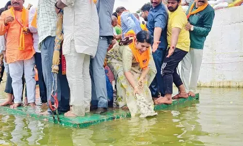 District Collector G Raja Kumari immersing a Ganesh idol in Nanydal on Friday District Collector G Raja Kumari immersing a Ganesh idol in Nanydal on Friday