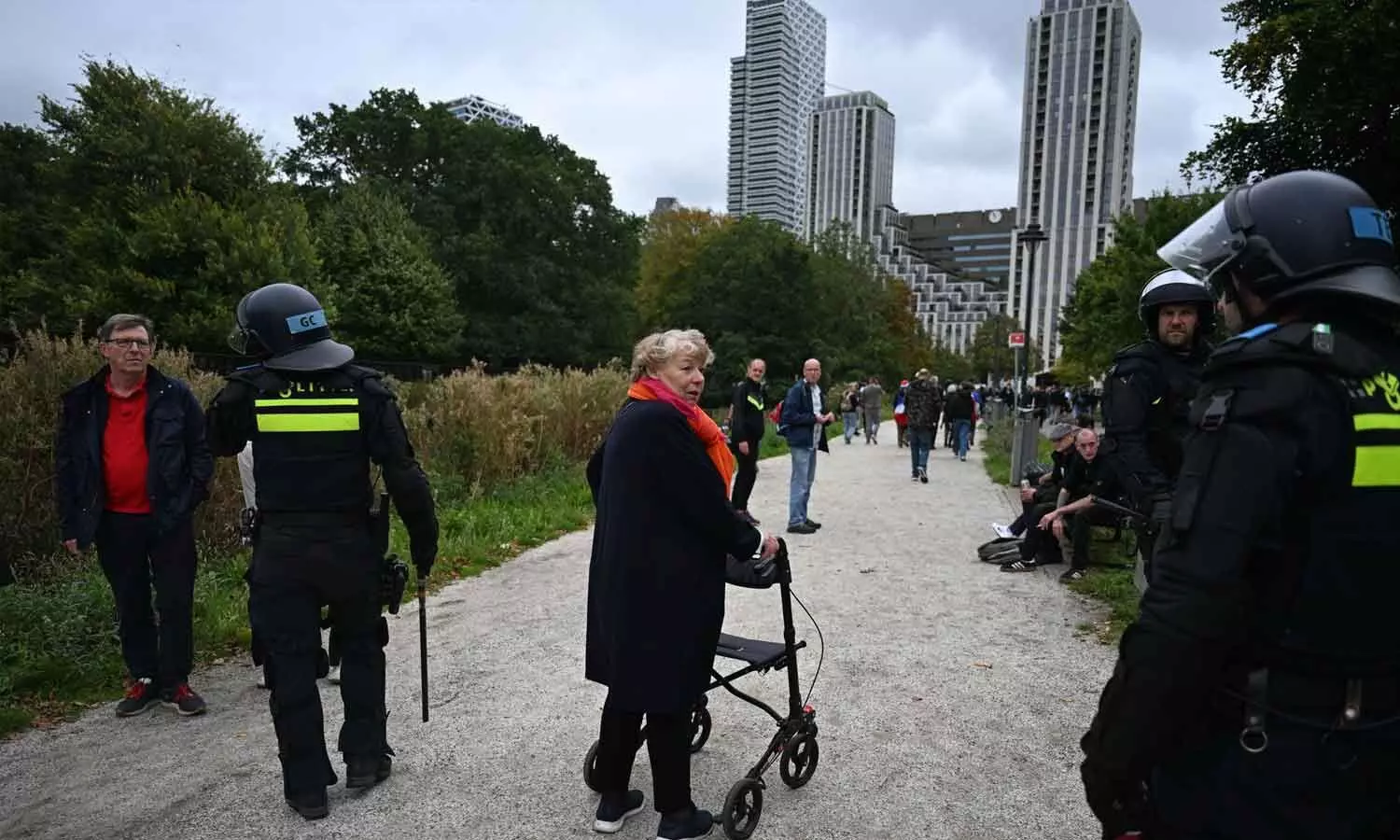 Dutch riot police break up far-right protest in The Hague after violence erupts Dutch riot police break up far-right protest in The Hague after violence erupts