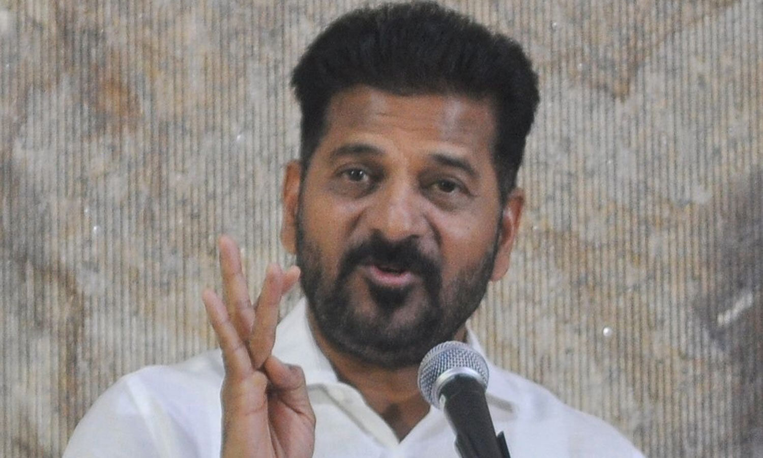 Revanth Reddy prepares land allegations against KCR family