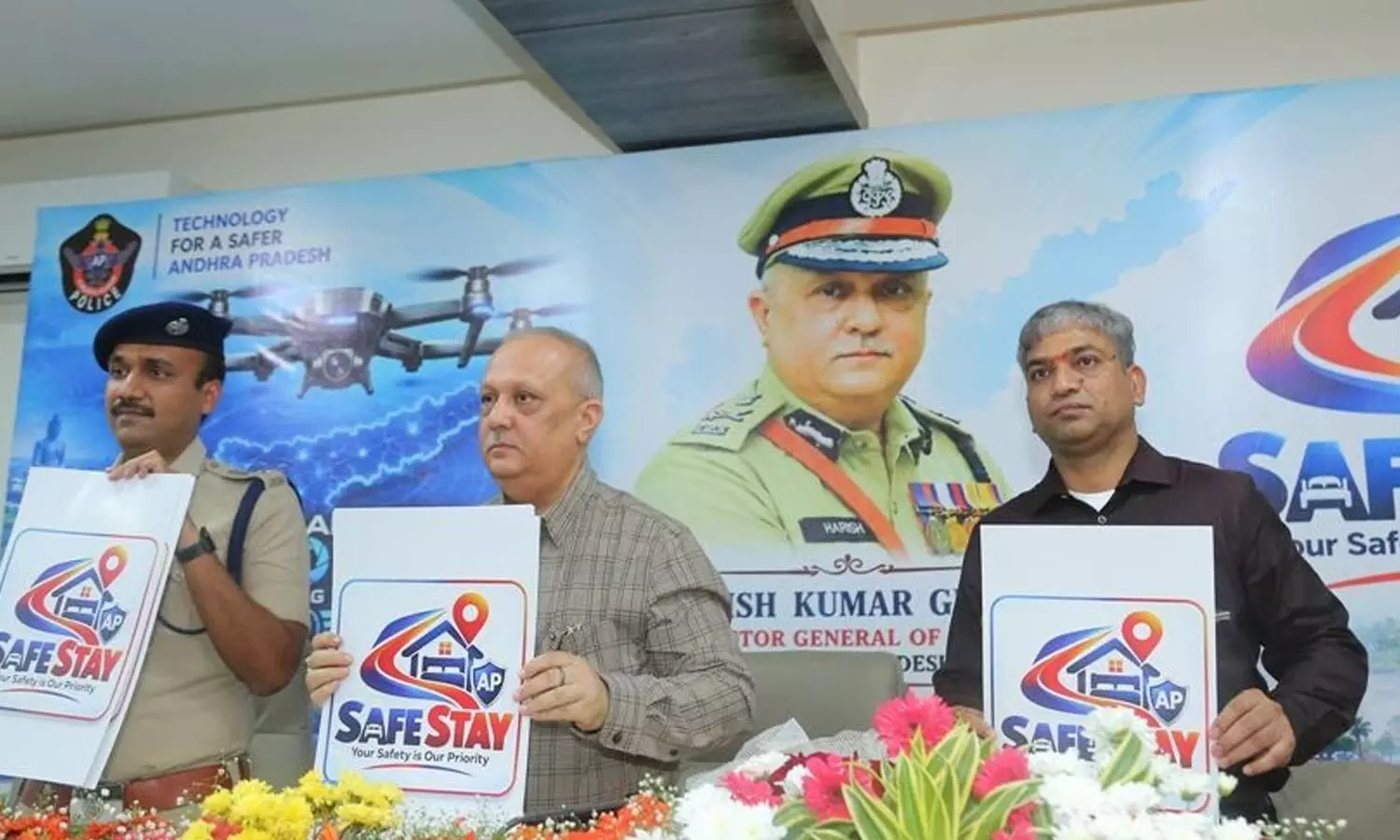 Director General of Police Harish Kumar Gupta along with Guntur district SP Vakul Jindal unveiling the ‘SafeStay’ application and its logo on Tuesday Director General of Police Harish Kumar Gupta along with Guntur district SP Vakul Jindal unveiling the ‘SafeStay’ application and its logo on Tuesday