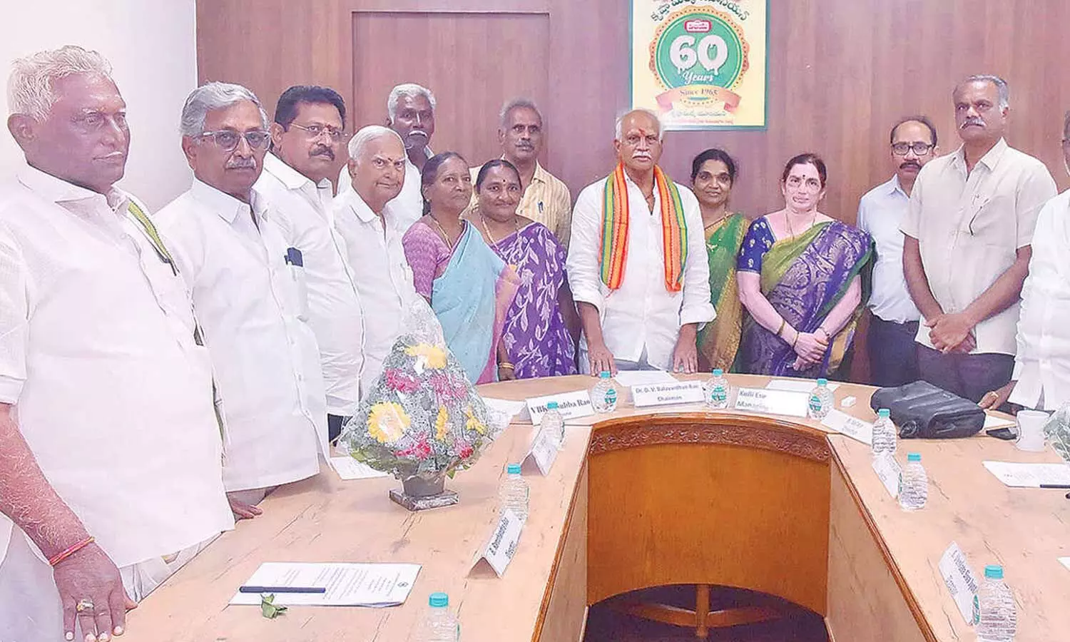 Dasari Venkata Balavardhana Rao, newly elected chairman of the Krishna District Milk Producers Mutually Aided Cooperative Union Limited (Vijaya Dairy), with board members and Managing Director Kolli Eswara Rao at the Milk Project on Tuesday Dasari Venkata Balavardhana Rao, newly elected chairman of the Krishna District Milk Producers Mutually Aided Cooperative Union Limited (Vijaya Dairy), with board members and Managing Director Kolli Eswara Rao at the Milk Project on Tuesday