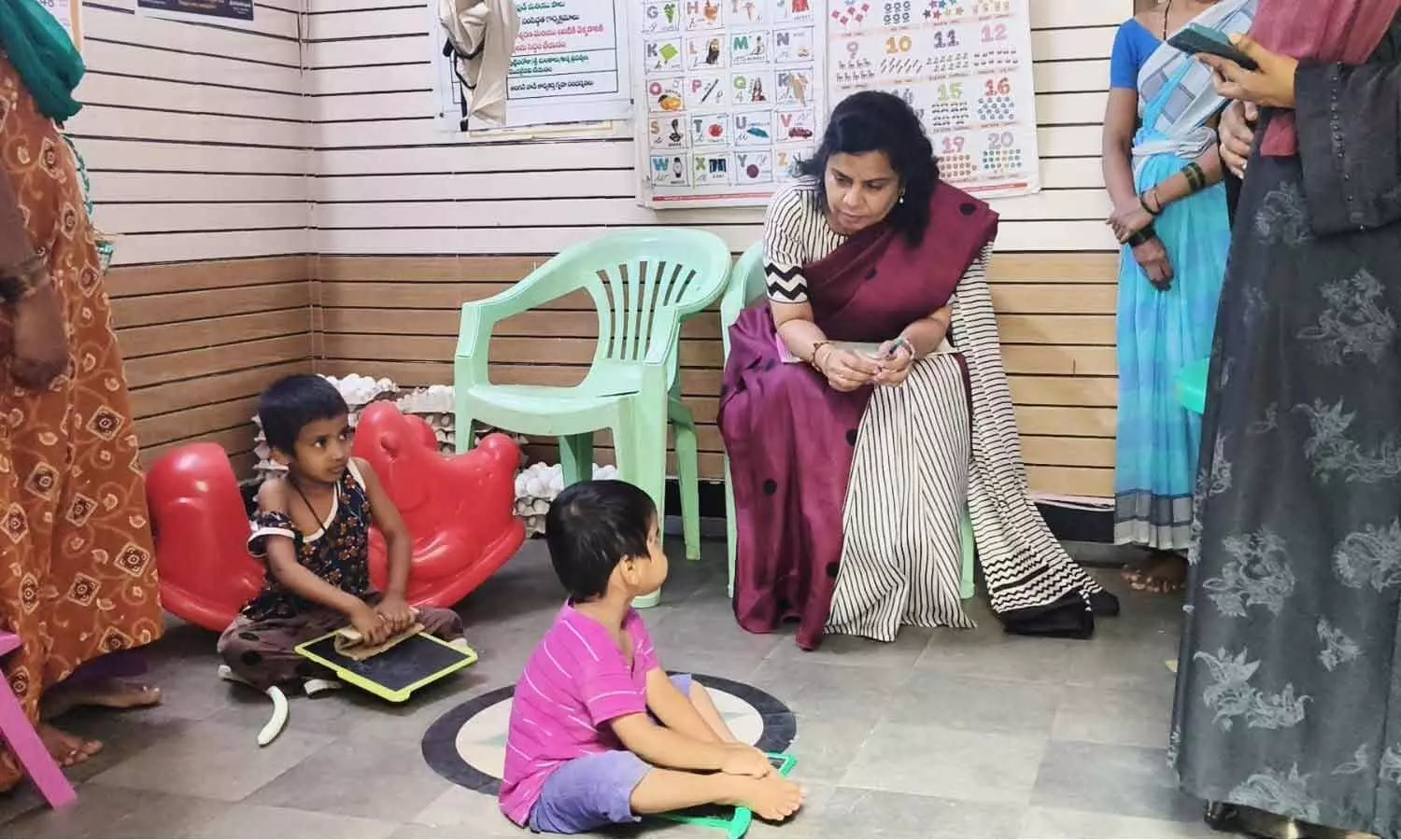 Women and Child Welfare and Empowerment Department Project Director P Vijaya inspecting Anganwadi centers at Erraburuju on Wednesday Women and Child Welfare and Empowerment Department Project Director P Vijaya inspecting Anganwadi centers at Erraburuju on Wednesday