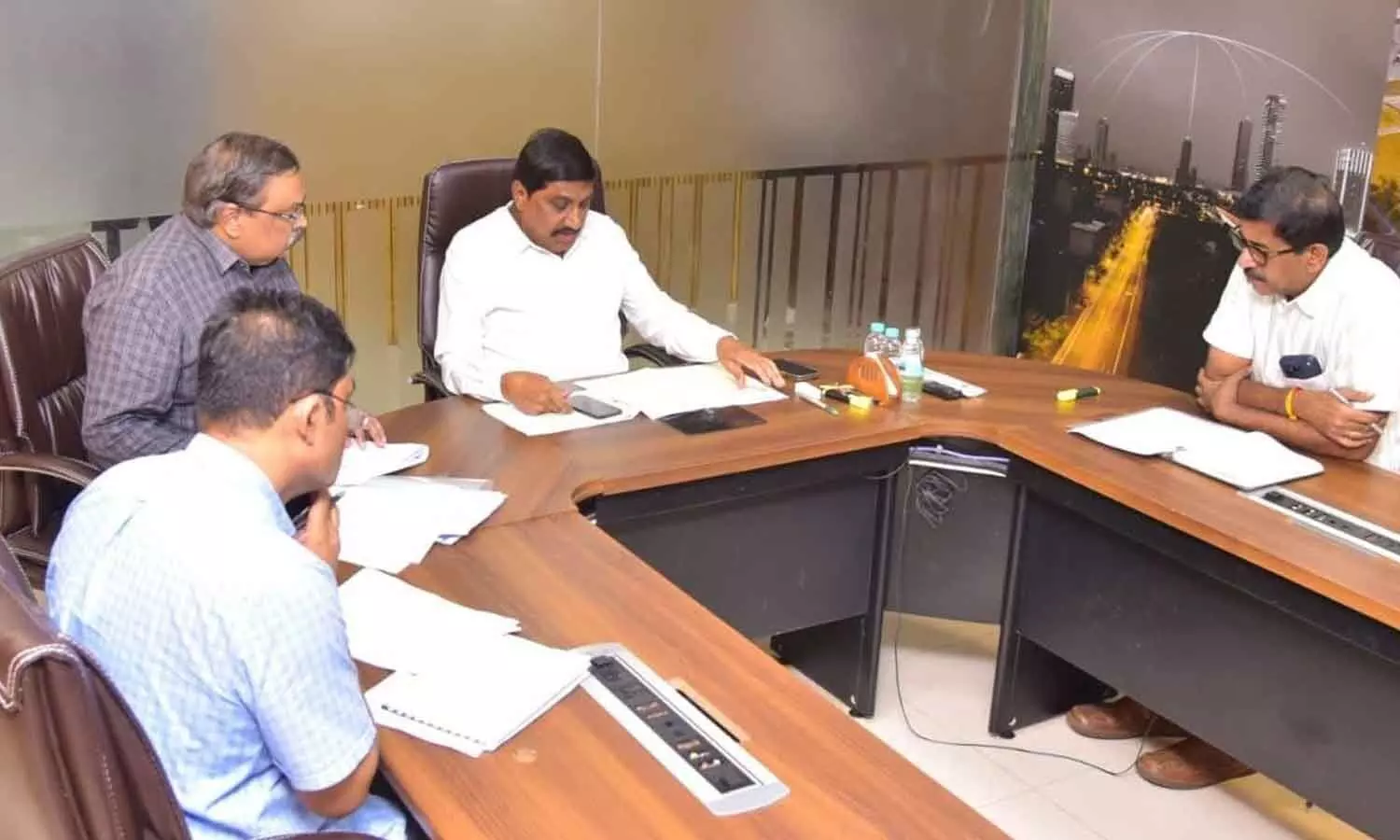 Roads and buildings minister B C Janardhan Reddy reviews rain effect on roads with senior officials at the Secretariat on Thursday Roads and buildings minister B C Janardhan Reddy reviews rain effect on roads with senior officials at the Secretariat on Thursday