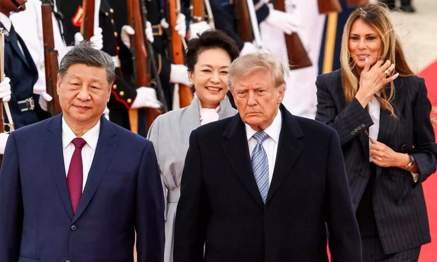 President Donald Trump, first lady Melania Trump, Chinas President Xi Jinping and his wife Peng Liyuan participate in an arrival ceremony at Joint Base Andrews on Wednesday President Donald Trump, first lady Melania Trump, Chinas President Xi Jinping and his wife Peng Liyuan participate in an arrival ceremony at Joint Base Andrews on Wednesday