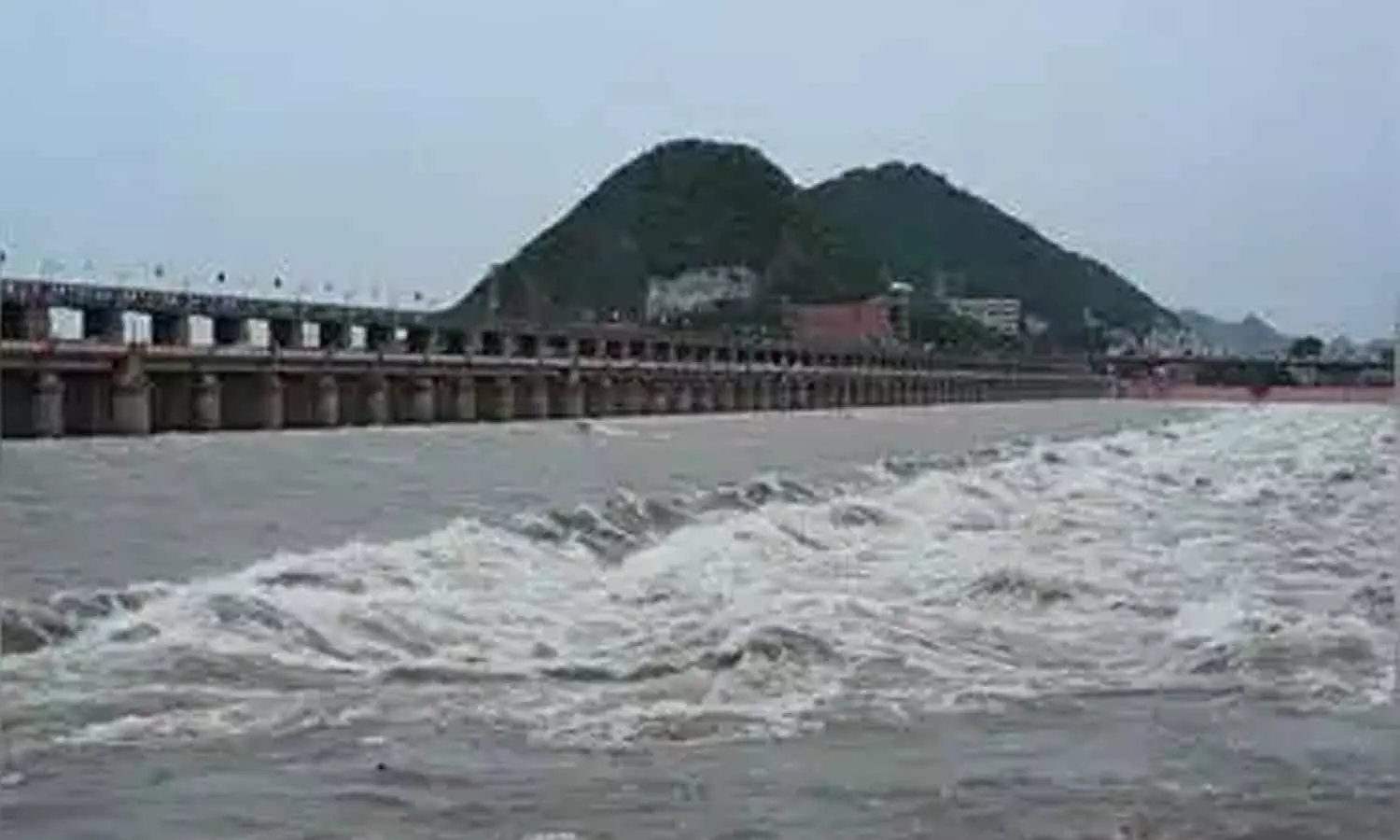 Prakasam barrage releases 14,500 cusecs of surplus water Prakasam barrage releases 14,500 cusecs of surplus water