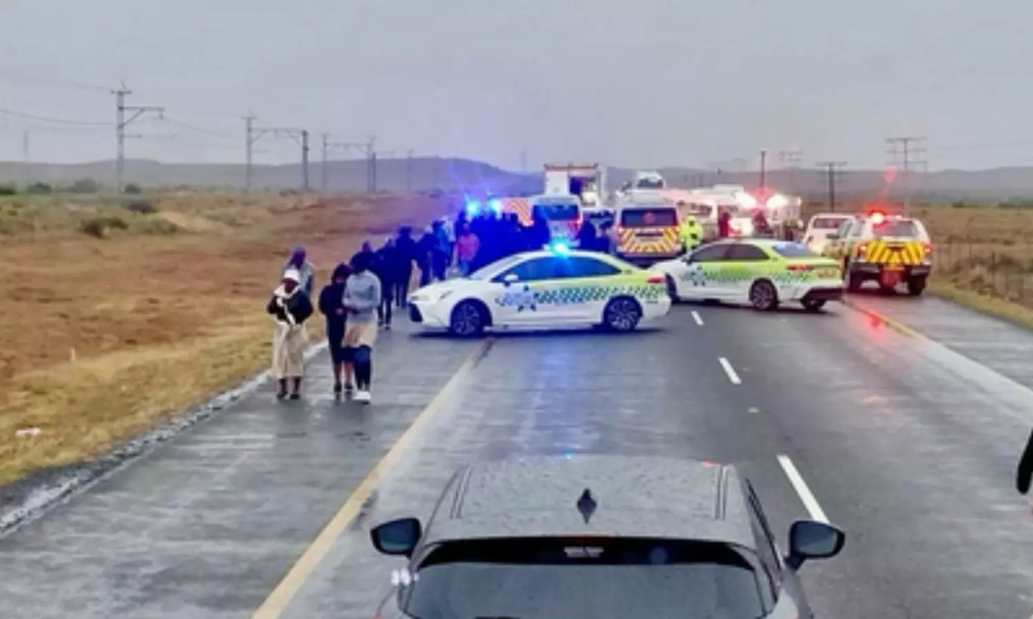 As many as 11 people were killed and eight others critically injured in a head-on collision As many as 11 people were killed and eight others critically injured in a head-on collision