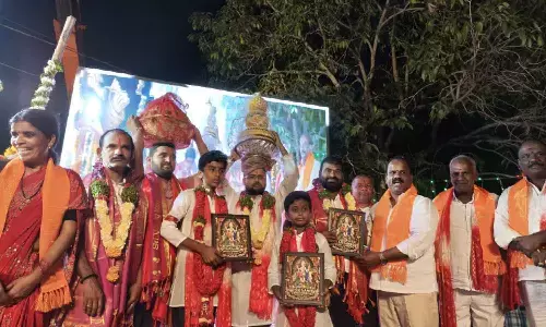 Members and participants holding framed portraits during the Sri Sai Ganesh Utsav Committee’s annual festival celebrations in Hyderabad, where Patineni Suresh and Patineni Harish jointly secured the sacred Ganesh laddu for Rs 3.26 lakh Members and participants holding framed portraits during the Sri Sai Ganesh Utsav Committee’s annual festival celebrations in Hyderabad, where Patineni Suresh and Patineni Harish jointly secured the sacred Ganesh laddu for Rs 3.26 lakh