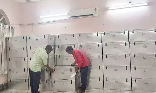 VMC officials preparing the required stationery for Returning Officers’ at the Council Hall building in Vijayawada Municipal Corporation headquarters