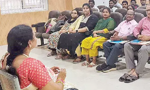 NTR ZP Deputy CEO Kodali Anuradha holding a meeting with staff at the meeting hall in the Panchayat Raj Engineering premises in Vijayawada on Monday