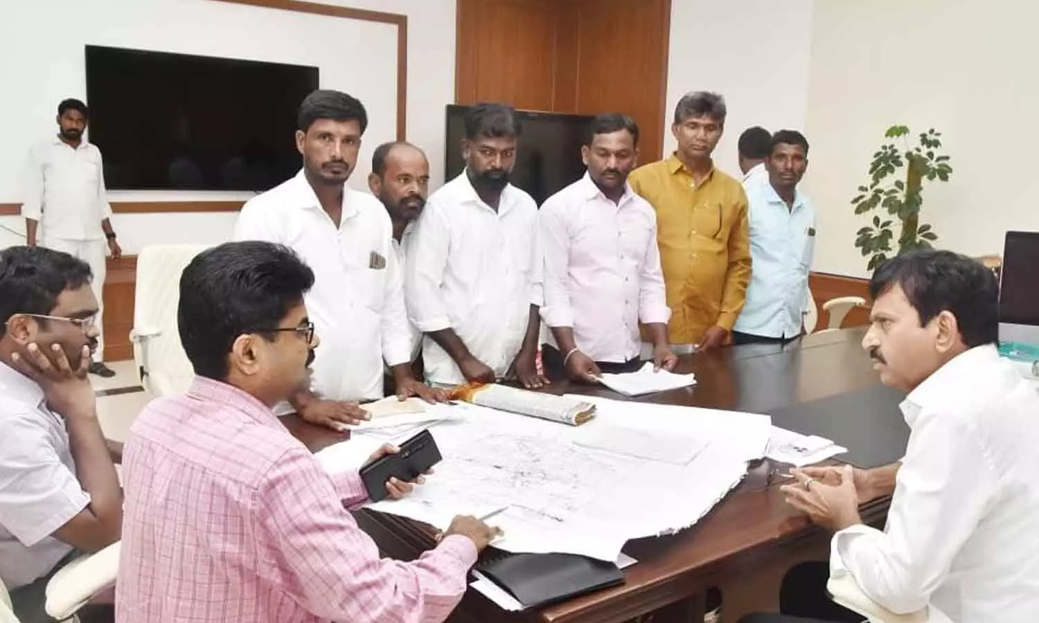 Revenue Minister Ponguleti Srinivas Reddy (right) reviewing a representation from farmers of Sivaru Venkatapur regarding alleged land rights issues on the Dharani portal, at the Secretariat in Hyderabad on Tuesday Revenue Minister Ponguleti Srinivas Reddy (right) reviewing a representation from farmers of Sivaru Venkatapur regarding alleged land rights issues on the Dharani portal, at the Secretariat in Hyderabad on Tuesday