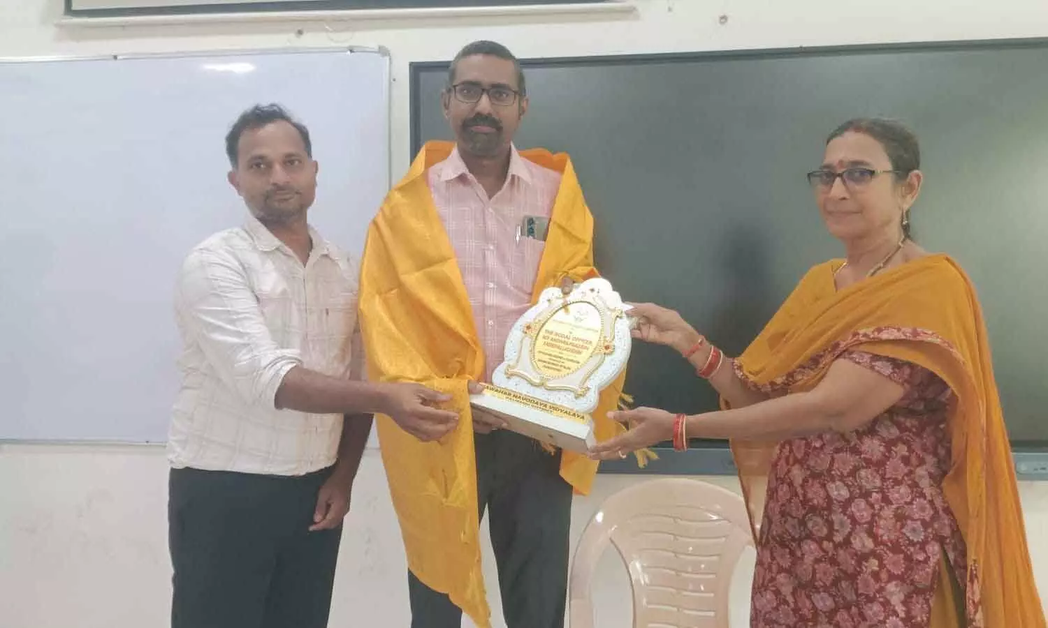 AP NIT Dean of Planning and Development Dr Sandeep being felicitated with a shawl and memento AP NIT Dean of Planning and Development Dr Sandeep being felicitated with a shawl and memento