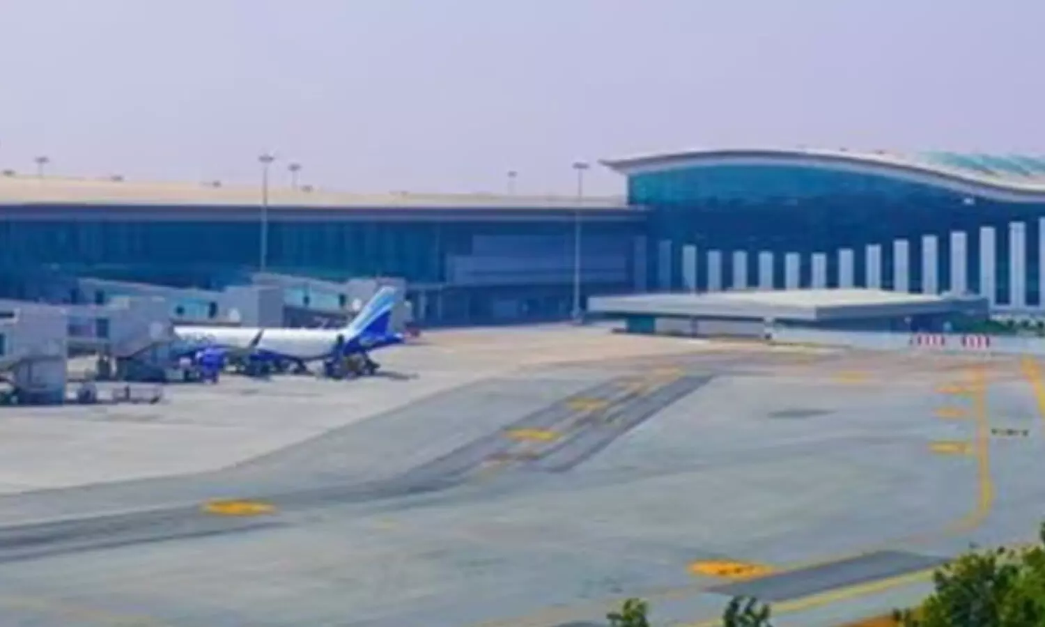 Passenger tries to open plane’s emergency exit at Hyderabad airport Passenger tries to open plane’s emergency exit at Hyderabad airport