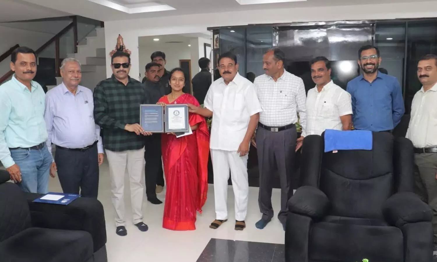 Rajpath Infra representatives presenting the Guinness World Record shield to MLA Palle Sindhura Reddy and former Minister Dr Palle Raghunatha Reddy in Puttaparthi on Friday Rajpath Infra representatives presenting the Guinness World Record shield to MLA Palle Sindhura Reddy and former Minister Dr Palle Raghunatha Reddy in Puttaparthi on Friday