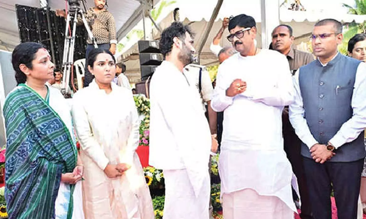 Minister Anam Ramanarayana Reddy and Collector S Venkateswar speaking to the family members of Kalki Bhagawan at Ekam Kshetra on Friday Minister Anam Ramanarayana Reddy and Collector S Venkateswar speaking to the family members of Kalki Bhagawan at Ekam Kshetra on Friday