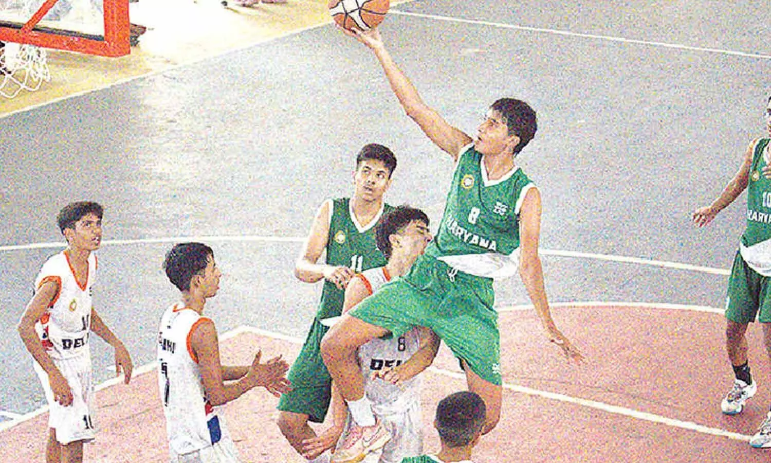 Haryana and Delhi players in action during their boys’ quarter-final match at the 51st Sub-Junior National Basketball Championship at the Maris Stella Indoor Stadium in Vijayawada Haryana and Delhi players in action during their boys’ quarter-final match at the 51st Sub-Junior National Basketball Championship at the Maris Stella Indoor Stadium in Vijayawada