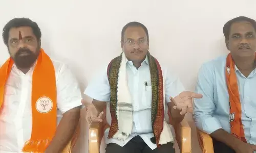 BJP leaders addressing the media in Kakinada on Friday