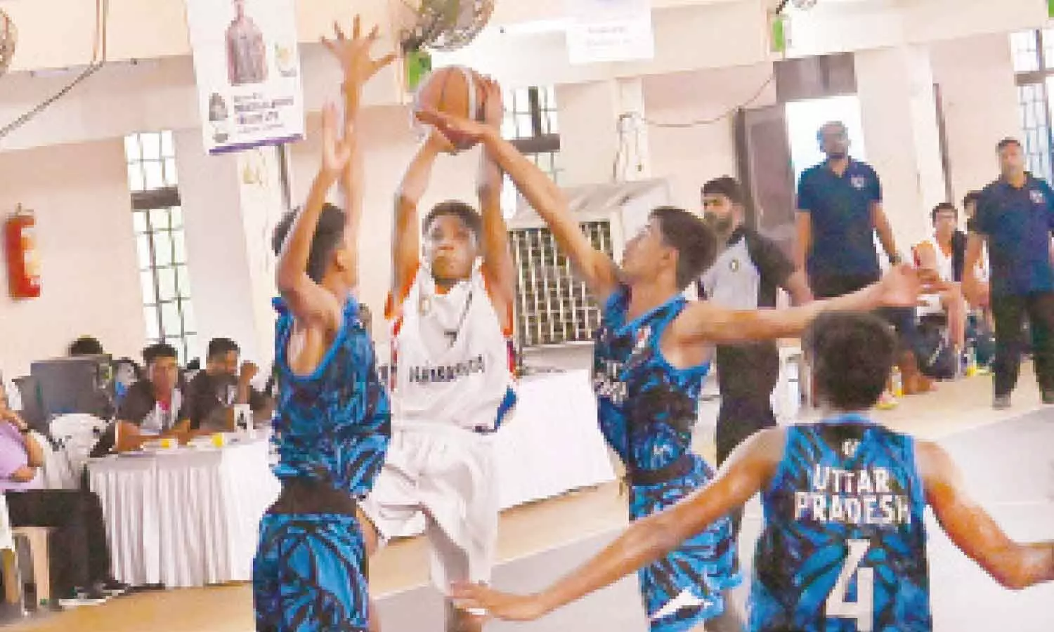 Action between Maharashtra and Uttar Pradesh boys during the semi-final match of 51st Sub-Junior National Basketball Championship at Maris Stella College in Vijayawada on Saturday Action between Maharashtra and Uttar Pradesh boys during the semi-final match of 51st Sub-Junior National Basketball Championship at Maris Stella College in Vijayawada on Saturday
