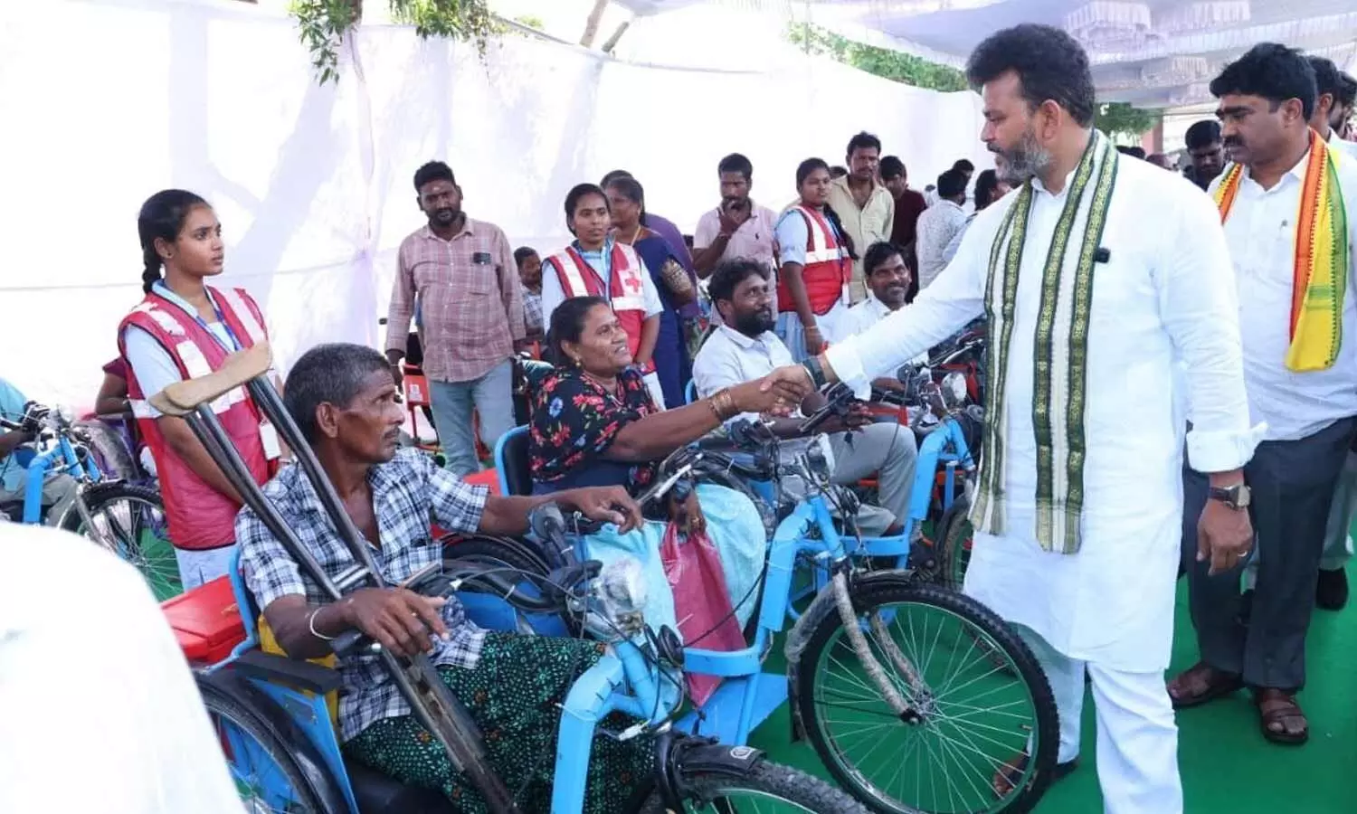 Union Civil Aviation Minister Kinjarapu Ram Mohan Naidu interacting with differently-abled persons at the programme organised in Srikakulam on Sunday Union Civil Aviation Minister Kinjarapu Ram Mohan Naidu interacting with differently-abled persons at the programme organised in Srikakulam on Sunday