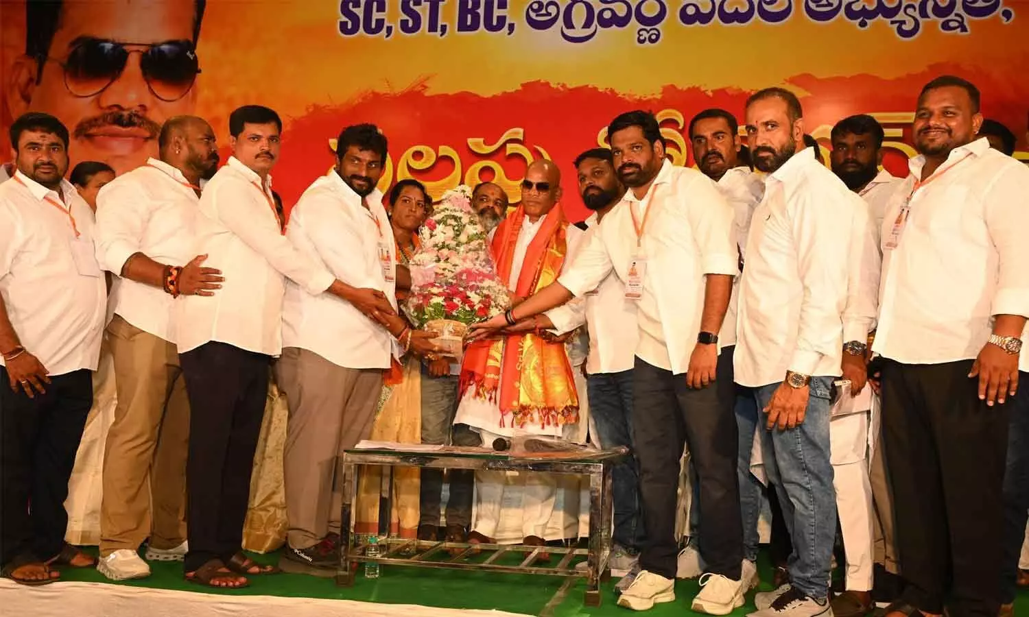 Ganesh Utsav Samithi secretary and Khairatabad senior leader Palapugu Govardhan being felicitated during an Atmeeya Sammelan in Hyderabad on Sunday Ganesh Utsav Samithi secretary and Khairatabad senior leader Palapugu Govardhan being felicitated during an Atmeeya Sammelan in Hyderabad on Sunday