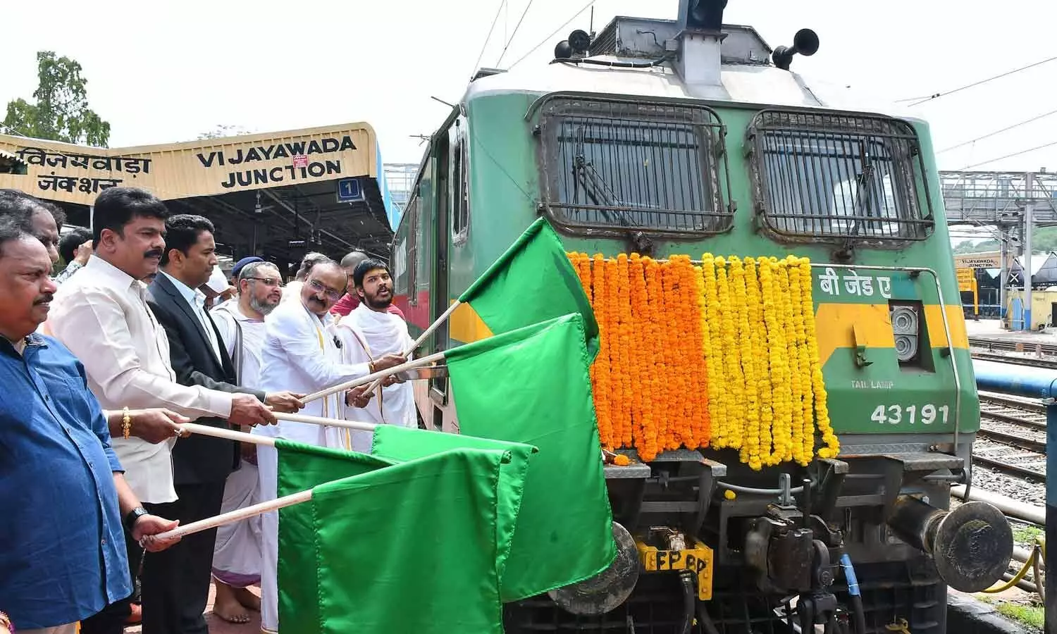 Government Whip and MLA Bonda Umamaheswara Rao, NTR district Collector Dr G Lakshmisha, Endowments Commissioner K Ramachandra Mohan and others flag off the Somnath Swabhiman Yatra special train at Vijayawada Railway Station on Sunday Photo: Ch Venkata Mastan Government Whip and MLA Bonda Umamaheswara Rao, NTR district Collector Dr G Lakshmisha, Endowments Commissioner K Ramachandra Mohan and others flag off the Somnath Swabhiman Yatra special train at Vijayawada Railway Station on Sunday Photo: Ch Venkata Mastan