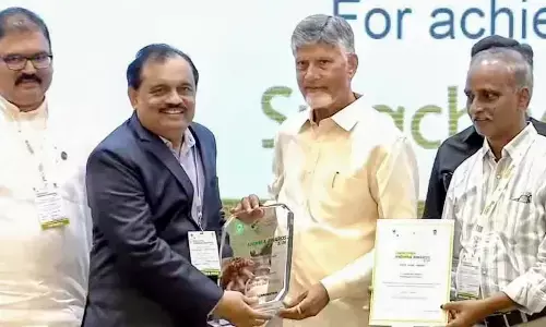 Regional Manager and District Public Transport Officer (DPTO) B Appala Naidu receiving the award from Chief Minister N Chandrababu Naidu in Vijayawada