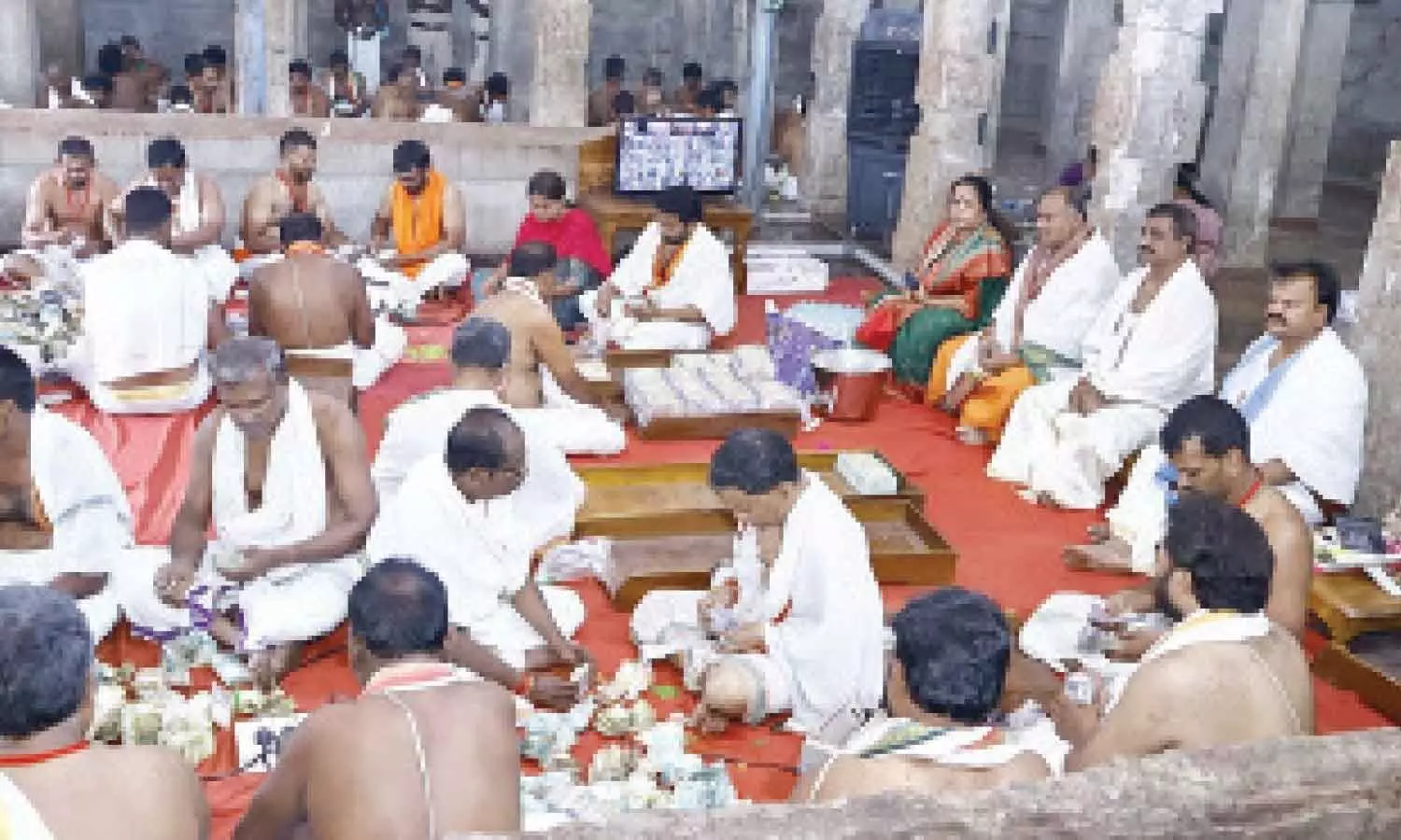 Srikalahasti Devasthanam Chairman K Sai Prasad, EO BK Venkatesulu and others monitoring hundi counting on Monday Srikalahasti Devasthanam Chairman K Sai Prasad, EO BK Venkatesulu and others monitoring hundi counting on Monday