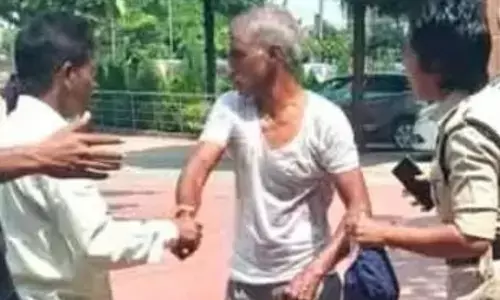 A petitioner attempted suicide by pouring petrol on himself during the Prajavani grievance redressal programme at the Warangal Collectorate