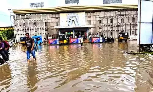 Heavy Rains Flood Bhimavaram, roads waterlogged Heavy Rains Flood Bhimavaram, roads waterlogged