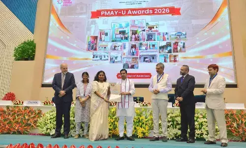Andhra Pradesh special secretary, housing, M Hephsiba Rani Korlapati receiving the Pradhan Mantri Awas Yojana–Urban 2.0 (PMAY-U 2.0) Award 2026 from Union minister of state for housing and urban affairs Tokhan Sahu in New Delhi on Monday