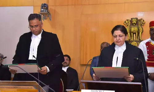 Andhra Pradesh High Court Chief Justice Lisa Gill administers oath to one of the five new judges at High Court on Monday